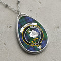 Calder clan Scottish tartan necklace with clan crest and Be Mindful motto on tartan background
