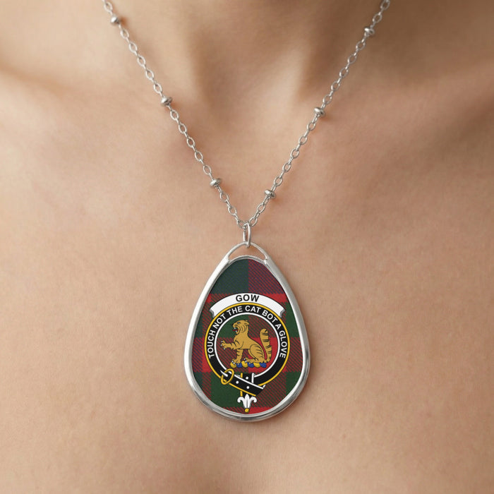 Close-up of Gow clan tartan pendant necklace with crest design