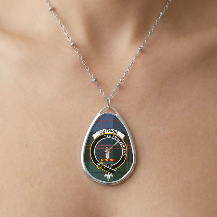 Close-up of Guthrie clan tartan pendant necklace with crest design