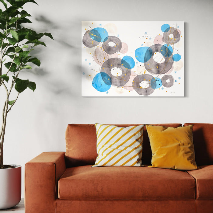 The artwork 'Subconscious Inclination' by Jocelyn Benford features ethereal watercolor circles in vibrant turquoise blue and smoky gray, scattered across white paper. Delicate splatter effects and mixed media elements create an abstract, floating composition with translucent overlapping forms and subtle pink undertones. 42x31 inches watercolor and mixed media on paper by Jocelyn Benford.